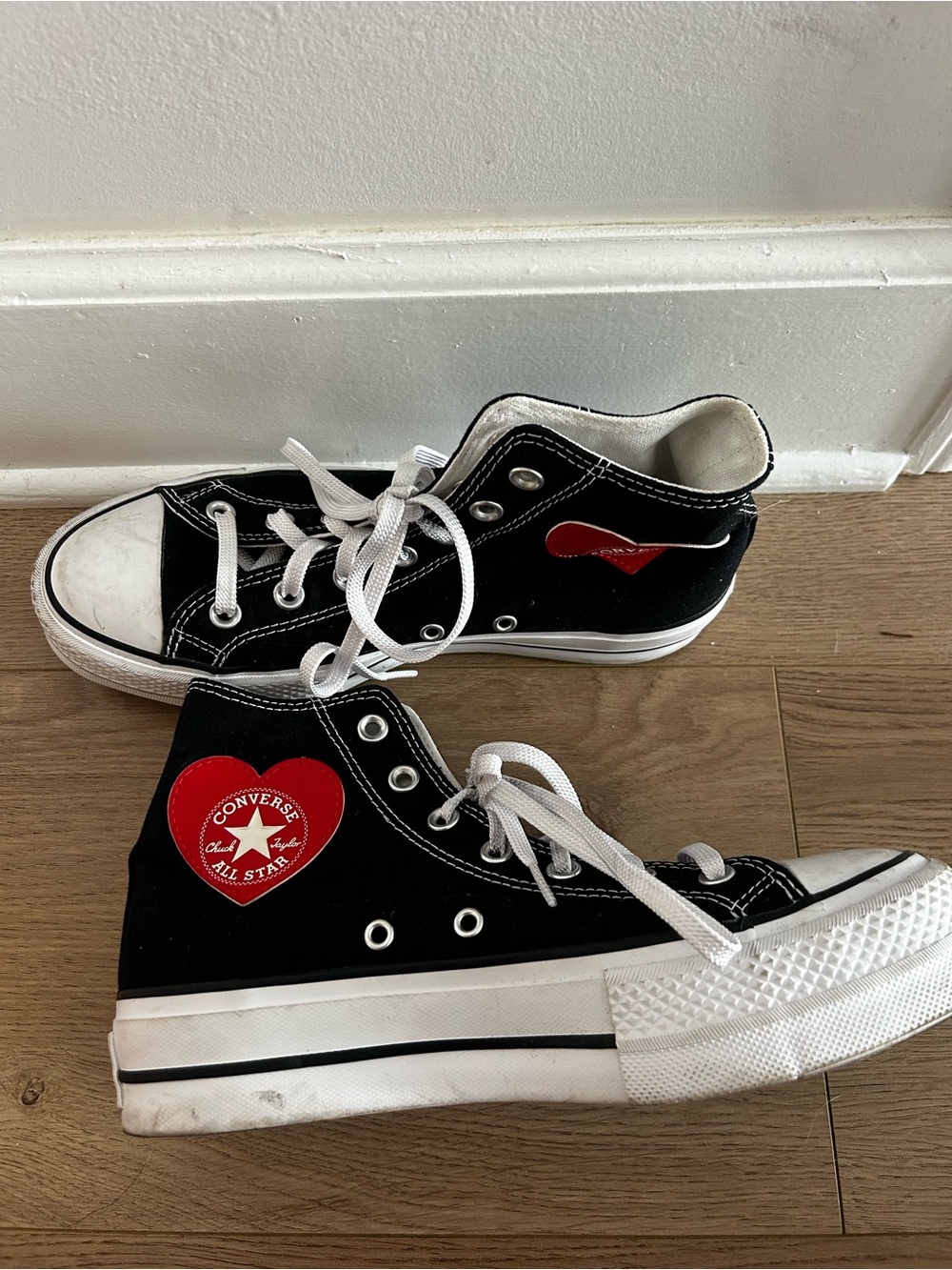 Converse Black High-Top Platform Sneakers with Red Heart Patch